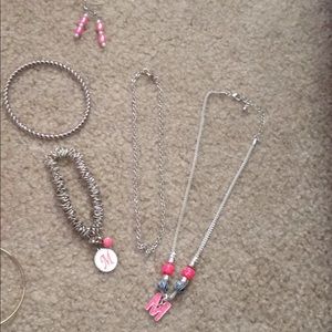 2 necklaces, 2 bracelets and 1 pair of earrings